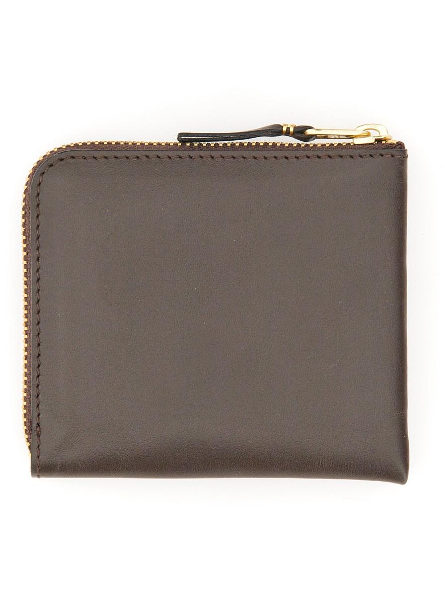 COMME DES GARCONS WALLET PORTAFOGLIO IN PELLE CON ZIP Sostegno trimestrale
